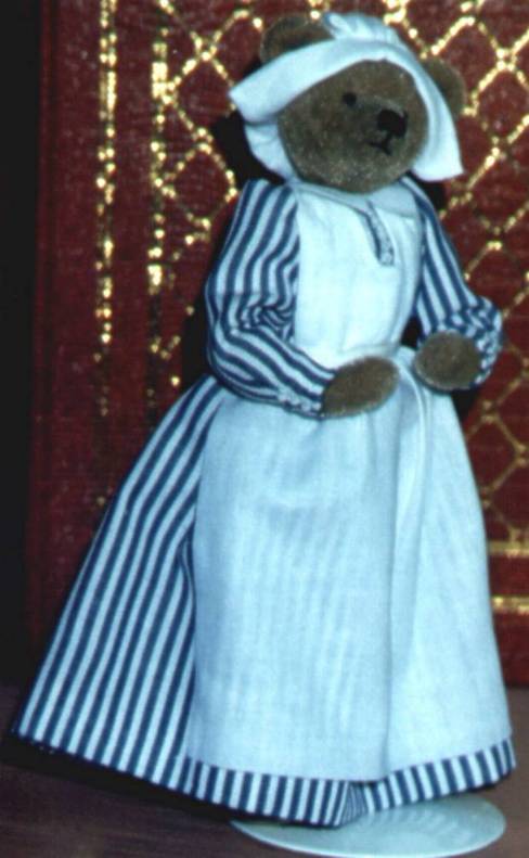 Maid in her stripey uniform